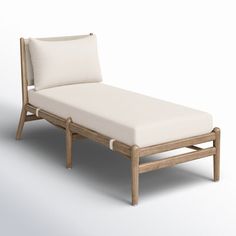 a bed that is made out of wood and white sheets