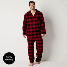 Perfect for lounging at home or a matching family photo moment during the holidays, this North Pole Trading Co. men's big 2-piece pajama set features a classic red and black buffalo plaid pattern. Made from cotton-flannel, it includes a long-sleeve button-down top with a notch collar and a chest slip pocket paired with matching drawstring pants with side slip pockets.# Pieces In Set: 21st Piece Description: Top1st Piece Collar: Notch Collar1st Piece Pockets: 1 Chest Slip Pocket(s)1st Piece Appar Photo Moment, Buffalo Plaid Pattern, Notch Collar, North Pole, Drawstring Pants, Cotton Flannel, Family Photo, Buffalo Plaid, Plaid Pattern