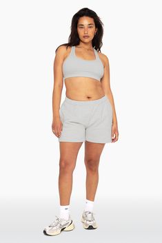 Indulge in laid-back luxury with our Sweat Shorts in Heather Grey. Boasting a leg-lengthening fit, clean sewn bottom hem, and high rise, these shorts offer both comfort and style. Made from our heavyweight sweats fabric, they guarantee coziness. Embroidered with the SET logo on the upper right thigh, they add a touch of elegance to your loungewear collection. Athleisure Activewear For Lounging, Short Length, Short Length Athleisure Activewear For Lounging, Athleisure Activewear For Lounging, Athleisure Shorts With Ribbed Waistband For Lounging, Athleisure Activewear Shorts For Lounging, Athleisure Stretch Shorts For Lounging, Stretch Athleisure Shorts For Lounging, Sweatpants With Built-in Shorts For Loungewear, Short Length Sweatpants With Built-in Shorts For Loungewear