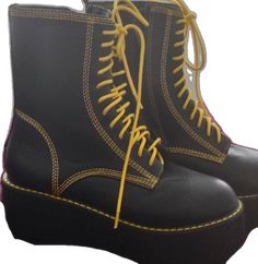 Black Casual Closed Toe Platform Boots, Casual Black Closed Toe Platform Boots, Black Martin Boots For Spring, Yellow Lace-up Platform Boots, Black Platform Martin Boots For Spring, Black Martin Boots With Round Toe For Spring, Black Ankle Martin Boots For Spring, Yellow Boots For Streetwear, Black High-top Boots For Spring