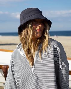 Surf’s up, hat on. Layer on a little added sun protection on your next beach day with this handy accessory—or simply top off your everyday look with a fun finishing touch. French terry Flat top Round brim Beachy Tops With Upf 50+ For Vacation, Beachy Upf 50+ Tops For Spring, Summer Tops With Upf 50+ For Poolside, Casual Tops With Upf 50+ For Beach, Sporty Sun Hat With Curved Brim For Beach, Sporty Beach Hats With Uv Protection, Casual Tops With Uv Protection For Poolside, Casual Uv Protection Tops For Poolside, Casual Poolside Tops With Uv Protection