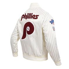 a baseball jacket with the philadelphia phillies logo and pinstripe on it's sleeves