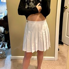 Brand New W/Out Tags Wild Fable Pleated Skirt In White Size Small. Pleated Skirts Are Very In Right Now And This One Is So Cute And Made From A Great Material. It Is Thick And Not See Through. It Has A Size Zipper Closure And Button On Top. This Is Great For Year Round Wear And Goes With Anything From Oversized Sweatshirts To Cute Cardigans! Thanks For Checking Out My Closet! Preppy High Waist Pleated Mini Skirt, High Waist Pleated Tennis Skirt In Preppy Style, Preppy High Waist Pleated Tennis Skirt, Preppy High-waisted Pleated Skirt, High Waist Pleated Preppy Skirt, White Pleated School Uniform Skirt, White School Uniform Skirt For Summer, White High-waist Bottoms For School, White Mini Skirt For School