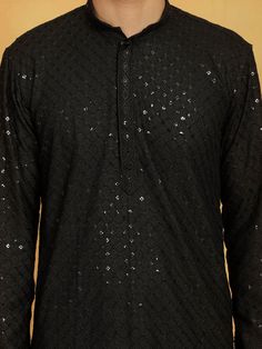 VASTRAMAY Men's Black Cotton Blend Kurta Upgrade your ethnic wear collection with this stylish black kurta from VASTRAMAY. Made from cotton blend, this kurta is perfect for both casual and festive occasions. It features a mandarin collar, full button placket, and long sleeves, offering a blend of traditional and contemporary style. Features: Color: Black Fabric: Cotton Blend Design: Solid Sleeve Length: Long Sleeves Collar: Mandarin Collar Specifications: Brand: VASTRAMAY Fit: Regular Fit Occasion: Festive/Casual Wash Care: Hand Wash/Machine Wash Material & Care: 100% cotton. Hand-wash cold, wash dark colors separately, do not bleach, dry in shade, inside out, medium iron. Legal Disclaimer: The product is guaranteed to be 100% genuine. Product images are for illustrative purposes only. Ima Black Embroidered Kurta For Diwali, Black Self Design Kurta For Diwali, Black Kurta With Self Design For Festivals, Black Self Design Kurta For Festivals, Black Festival Kurta With Self Design, Black Self Design Kurta For Eid, Black Self-design Kurta For Festivals, Black Long Sleeve Bandhgala For Diwali, Black Long Sleeve Bandhgala For Festivals