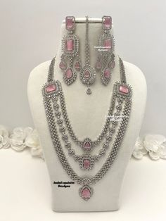 Three layered American Diamond long Necklace Set / CZ Necklace/Indian Jewelry/ Reception Jewelry/ Bollywood Jewelry/triple layer long necklace/Silver pink  All items are shipped from Brampton, Ontario, Canada. If you need your item by a certain day, please reach out to us for express delivery option before placing the order so that we can update the shipping for you. Standard shipping/delivery timeline Below are the estimated delivery times after the order is shipped/dispatched.  ---> USA delive Silver Double Strand Necklace For Wedding, Silver Layered Long Necklace, Layered Long Silver Necklace, Silver Layered Jewelry For Party, Layered Silver Jewelry For Parties, Layered Silver Necklaces For Parties, Silver Long Bridal Necklace For Party, Pink Multi-strand Jewelry For Party, Pink Multi-strand Necklace For Parties