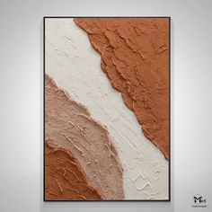 an abstract painting with brown and white paint on the wall in a modern style setting