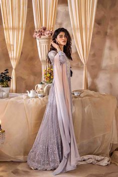 SKU:- 2315 Price for Shirt and inner only. This ethereal maxi dress is crafted from luxurious chiffon fabric adorned with intricate thread embroidery, embellished with shimmering pearls, enchanting French knots, and delicate beading.This festive ensemble is an absolute essential for the Eid season, showcasing agraceful flow and an exquisite blend of embellishments. The two-toned dupattaelegantly complements the overall look, elevating the ensemble to a sublime fashionstatement that captures the Organza Maxi Dress With Intricate Embroidery, Maxi Length Organza Dress With Intricate Embroidery, Evening Dresses In Georgette With Pearl Embroidery, Georgette Maxi Gown With Intricate Embroidery, Evening Dresses With Pearl Embroidery In Georgette, Maxi Length Georgette Gown With Intricate Embroidery, Intricate Embroidery Georgette Maxi Gown, Party Gown With Pearl Embroidery In Georgette, Long Georgette Gown For Reception