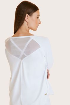 One of our favorite pieces in the line, this boyfriend fit long sleeve tee with a back mesh accent is so cozy you’ll never want to take it off. Crew neck long sleeve tee Mesh detail at back Loose throughout body Casual Sheer Sleeves Top For Layering, White Stretch Top With Mesh Back, White Long Sleeve Tops With Sheer Sleeves, Casual Tops With Sheer Sleeves And Stretch, White Long Sleeve Top With Sheer Sleeves, White Sheer Sleeve Tops For Fall, White Athleisure Top With Mesh Back, White Long Sleeve Mesh Top For Layering, White Casual Top With Sheer Sleeves