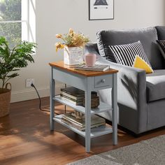 a living room with a gray couch and coffee table