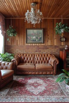 a living room filled with furniture and a chandelier