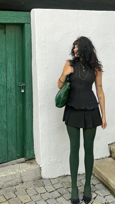 green thighs, bag and door i like iiiit Green Tights Outfit Aesthetic, Olive Green Tights Outfit, Rule Of 7 Outfits, Emerald Green And Black Outfit, Green Stockings Outfit, Tights Aesthetic Outfits, Outfits With Tights Aesthetic, Green Boots Outfit Winter, Black Tights Outfit Aesthetic