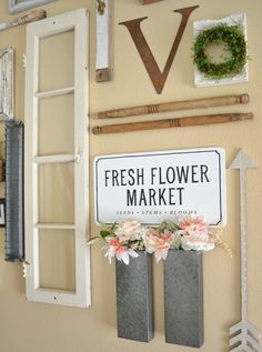 fresh flower market sign hanging on the wall