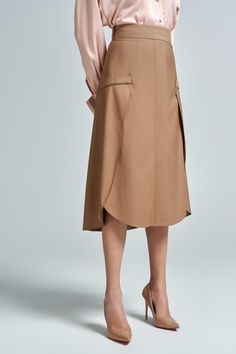 Modern A-line Lined Skirt, Modern A-line Skirt For Workwear, Beige A-line Pleated Skirt For Work, Office Long Skirt With Pockets, Versatile Solid Color Midi Skirt, Modern Knee-length Flowy Skirt, Relaxed A-line Office Skirt, Office Midi Skirt With Pockets, Solid Color Pleated Skirt With Pockets