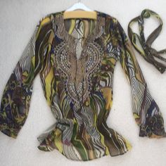 Gorgeous Chiffon Multi Colored Tunic By Kay Celine Has Elastic Ode Waist And Wrists With A Self Belt. Fits Sizes S-M. See Thru. Perfect Condition. Never Worn. Fitted Chiffon Blouse For Beach, Bohemian Chiffon Blouse For Party, Bohemian Style Multicolor Blouse For Party, Bohemian Multicolor Party Blouse, Bohemian Style Multicolor Party Blouse, Bohemian Chiffon Tops For Vacation, Embellished Summer Beach Blouse, Summer Beach Blouse Embellished, Summer Beach Embellished Blouse