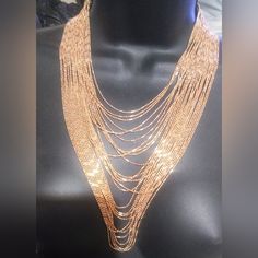 Beautiful, Women's, Long, Gold Tone, 26 Strands, Multi-Strand, Ball Chain, Waterfall, Bib, Statement, Necklace, Iron Alloy Metal, The Longest Point Measures Approx. 1' Foot, Has A 4" Inch Extender Chain, Two Bars With A Lobster Claw Closure, Elegant Style *Nwt. *Colors May Vary Due To Different Computers, Monitors, Phones, Calibrations, Or Settings. Rose Gold Metal Chain Necklace, Metal Layered Necklace With Beaded Chain For Party, Trendy Beaded Chain Necklace For Party, Party Necklace With Metal Chain Strap, Gold Layered Necklace With Beaded Chain, Trendy Rose Gold Metal Chain Necklace, Gold Layered Party Necklace, Long Double Chain Necklace For Parties, Trendy Multi-strand Chain Necklace For Party