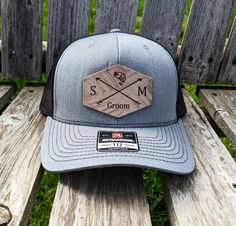 This customized hat is great for everyone in your wedding party. It adds a simple and personal touch to your groomsmen's gift, that will look amazing during and after your wedding. The leather patch in front will come completely customized in each of the cross arrow sections with their wedding title, your wedding date, their initials or Bride and Groom initials, etc. The top emblem will also be customized by your emblem of choice. If you are looking for a different emblem that we have listed, pl Groomsmen Hats, Groom Hat, Richardson Hats, Wedding Titles, Groomsman Gift, Wedding Hat, Wedding Party Gift, Hrithik Roshan, Wedding Hats