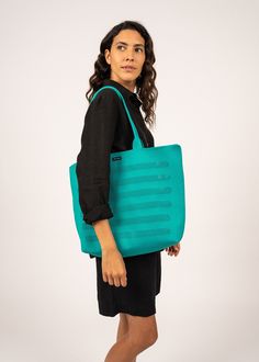 All sale or discounted merchandise is final sale and cannot be exchanged or returned. Step into summer in style with the SAC MAILLE bag. This bag combines a laid-back vibe with a structured look, making it both fashionable and effortless to carry. Its airy mesh design is ideal for complementing your summer outfits in Saint James' vibrant seasonal color. - Knitted - 100% Polyamide - Dimensions : 13.7" x 13.7" Green Bag With Removable Pouch For On-the-go, Summer Shoulder Bag For On-the-go, Trendy Summer Bags For On-the-go, Summer Double Handle Bags For On-the-go, Eco-friendly Green Shoulder Bag For On-the-go, Summer Tote Shoulder Bag For On-the-go, Summer Green Shoulder Bag For On-the-go, Green Rectangular Shoulder Bag For On-the-go, Green Shoulder Bag For On-the-go