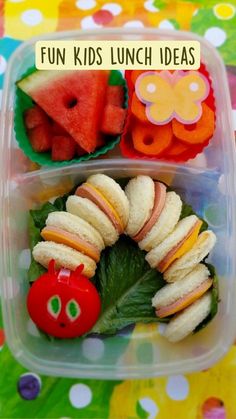 a plastic container filled with fruit and veggies