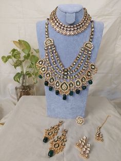 Tyaani inspired|sabyasachi jewelry|India Jewelry gold|green necklace|emerald jewelry|jadau necklace|haram set|panchladas|polki kundan|bollywood replica R O S H   J E W E L R Y Welcome to Rosh! Meet the perfect emerald bridal set, handmade and attentively crafted in India with only love!   This Tyaani Inspired necklace is an amazing amalgamation of meenakari  and emerald stone to amp up your colorful outfit.  Style it up with your best lehnga and spread the magic! If you're a bride-to-be looking Emerald Meenakari Kundan Necklace For Wedding, Green Kundan Chandbali Jewelry, Green Kundan Bridal Necklace Hand Set, Bollywood Style Emerald Kundan Necklace For Wedding, Emerald Jewelry With Stone Work For Festivals, Festive Emerald Kundan Chandbali Necklace, Festive Chandbali Kundan Necklace With Emerald, Green Kundan Jewelry Set, Traditional Kundan Necklace With Emerald