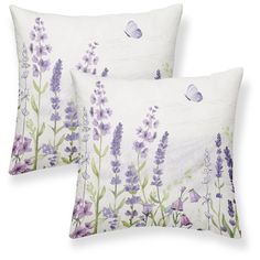 two pillows with lavender flowers and butterflies on them