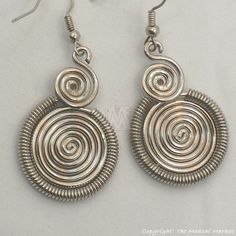 Silver Wire two Spirals Earrings Bohemian Nickel-free Silver-plated Wire Earrings, Traditional Silver Spiral Jewelry, Traditional Spiral Jewelry For Gifts, Traditional Spiral Silver Jewelry, Bohemian Silver Plated Nickel-free Jewelry, Bohemian Silver Plated Wire Earrings For Jewelry Making, Bohemian Nickel-free Silver-plated Jewelry, Handmade Bohemian Silver-plated Wire Jewelry, Handmade Bohemian Silver Plated Wire Jewelry