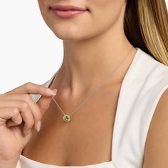 Complete your look with this simple, yet sophisticated pendant boasting a shimmering cushion-cut peridot flaunting a vivid hue. The 14k yellow gold design promises a luxurious warm luster, and features accent diamonds sparkling brightly along the corner prongs holding the center stone. Necklaces Blue, Pearl Jewelry Gift, Pearl Bracelet Gold, Platinum Rose Gold, Peridot Necklace, Gold Rings Fashion, August Birthstone, Gold Pearl Necklace, Green Gems