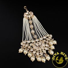 Beautiful designed Kundan Pasha , perfect for wedding day and any special celebration Nickel Free Metal : Brass Polish : Gold Perfect for all big occasion Designer wear Handcrafted Elegant Cutdana Tikka For Festivals, Elegant Chandbali Tikka For Celebration, Elegant Cutdana Tikka As A Gift, White Bridal Accessories With Stone Work For Wedding, Elegant Tikka For Diwali Celebration, White Cutdana Bridal Sets For Wedding, Elegant Wedding Tikka With Intricate Design, Chandbali Bridal Accessories With Stone Work For Wedding, Wedding Bridal Chandbali Accessories With Stone Work