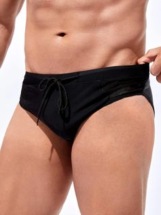 Elevate your beach attire with our Mesh Waist Swim Brief, a must-have addition to your swimwear collection. In classic black, this brief features a plain pattern and an eye-catching contrast mesh detail, adding a modern edge. The medium-stretch fabric ensures a comfortable fit, allowing you to enjoy your time in the water. Features: Color: Black Pattern Type: Plain Details: Contrast Mesh Type: Briefs Fabric: Medium Stretch Material: Fabric Care Instructions: Hand wash, do not dry clean Size Char Summer Nylon Swim Trunks Brief, Breathable Solid Nylon Swimwear, Black Nylon Swimwear For Vacation, Beachwear Mesh Bottoms For Beach, Breathable Stretch Black Swimwear, Black Breathable Nylon Swimwear, Nylon Brief Swimwear For Summer, Black Nylon Swim Trunks For Beach Season, Black Beachwear Swim Trunks For Pool