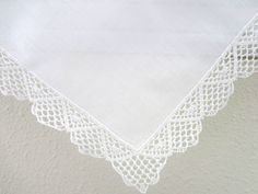 Lovely white lace handkerchief with sweet message for the mother of the bride. Handkerchief shown in main photo (no longer available), please select available style during checkout.Font style: scriptHandkerchief size: 11"x11"Handkerchief color shown: whiteEmbroidery color shown: white Elegant White Handkerchiefs With Crochet Lace, Classic Handkerchiefs With Lace Trim As Gift, Elegant White Handkerchiefs With Lace Work, Elegant Lace Work Handkerchiefs Gift, Elegant White Lace Handkerchiefs, Classic White Lace Handkerchiefs, Classic White Lace Handkerchief, Classic White Lace Work Handkerchiefs, White Lace Handkerchiefs With Embroidery