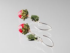 Gass Strawberry Earrings accented by olivine green handmade glass leaves and hung on your choice of sterling silver or 14/20 gold-filled ear wires.  The strawberry beads on these earrings are each about 15mm high.  You may also choose between five different ear wire styles.  Your jewelry will be carefully packed with biodegradable plant fiber inside a 100% recycled paper gift box with a stretch bow.   These strawberry earrings will help you remember summer even during the dark of winter!  Any fo Czech Glass Jewelry With Matching Earrings For Gifts, Czech Glass Jewelry Set With Matching Earrings As Gift, Handmade Czech Glass Drop Earrings, Whimsical Czech Glass Jewelry With Ear Wire, Nickel-free Czech Glass Jewelry Gift, Whimsical Czech Glass Jewelry Set With Earrings, Whimsical Czech Glass Silver Jewelry, Whimsical Silver Czech Glass Jewelry, Whimsical Handmade Glass Jewelry