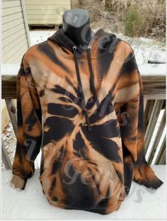 This hoodie actually came about accidentally. I'm glad it did because I have had such a good response to this orange bleached hoodie online that I decided to post it to my shop! :)  Each reverse tie dye hoodie is 60% cotton and 40% polyester.  The brand I use for these hoodies are The Fruit of The Loom EverSoft.  Fruit of the Loom fleece is made with EverSoft ring spun cotton for premium softness wash after wash.  This great fleece collection offers a variety of great benefits to keep you feelin Trendy Acid Wash Hooded Hoodie, Trendy Acid Wash Sweatshirt With Drawstring Hood, Trendy Tie-dye Sweatshirt For Winter, Trendy Tie Dye Sweatshirt For Streetwear, Trendy Tie Dye Sweatshirt For Winter, Trendy Tie-dye Hoodie For Winter, Trendy Tie Dye Hoodie For Winter, Trendy Tie Dye Hoodie For Streetwear, Trendy Tie Dye Winter Hoodie