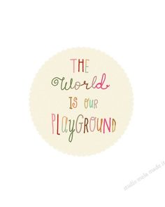 the world is our playground quote on a white circle with pink, green and yellow lettering