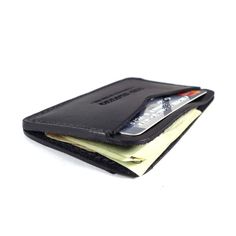 For those who like to keep their wallets in their front pockets. Slim enough to comfortably carry and large enough to fit your essential cards and some cash. Black Bifold Coin Purse With Card Slots, Black Wallets With Card Slots, Black Trifold Wallet With Card Slots For Everyday, Everyday Black Trifold Wallet With Card Slots, Black Bifold Card Holder For Everyday Use, Black Wallets With Card Slots For Everyday Carry, Black Wallets With Card Slots For Everyday, Black Bifold Card Holder For Everyday Carry, Bifold Card Holder With Flat Pocket For Daily Use