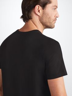 Our signature Basel men’s t-shirt in black is a wardrobe essential: versatile and classic. Made from a unique blend of stretch micro modal for an extraordinarily soft and comfortable wear, it will quickly become your go-to black t-shirt. Perfect for sleeping, lounging or making a long-haul flight a lot more bearable. Featuring a soft crew-neck band finish and a streamlined shape that is both comfortable and flattering, we've elevated this loungewear t-shirt into a luxury essential. One of our si Long Haul Flight, Long Haul, Body Heat, Basel, Black Pattern, Soft Black, Black T Shirt, Black Shorts, Free Shopping