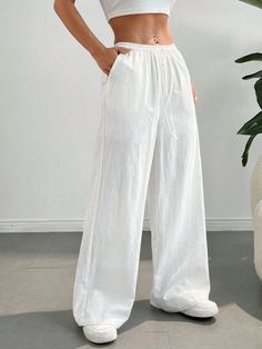 Style:Casual \nClosure Type:Drawstring Waist \nDetails:Pocket \nColor:White \nPattern Type:Plain \nType:Wide Leg \nFit Type:Loose \nLength:Long \nWaist Line:Natural \nMaterial:Cotton \nComposition:100% Cotton \nLining:100% Polyester \nCare Instructions:Machine wash or professional dry clean \nSheer:No \nFabric:Non-Stretch \nBody:Lined \nTemperature:Spring/Fall (18-25℃/63-77℉) \n White Bow Tie, White Bow, Drawstring Waist, Bow Tie, Style Casual, Wide Leg, Dry Clean, Solid Color, White