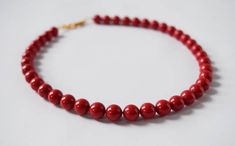 Red Coral Beaded Necklace Swarovski Coral Regency Necklace Formal Red Coral Beaded Necklace, Classic Red Beaded Necklace As Gift, Classic Red Beaded Necklace For Gift, Classic Red Necklace With Polished Beads, Classic Red Single Strand Beaded Necklace, Classic Red Round Beaded Necklaces, Classic Red Single Strand Necklace, Formal Red Beaded Necklaces With Polished Beads, Formal Red Beaded Necklace With Polished Beads