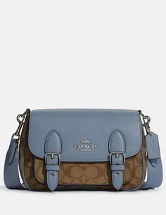 Signature coated canvas and refined pebble leatherInside zip and multifunction pocketsSnap closure, fabric liningOutside open pocketDetachable strap with 25" drop for shoulder or crossbody wear8 3/4" (L) x 6 1/4" (H) x 3 1/4" (W)Style No. C6781Color: Khaki Marble Blue Luxury Blue Coach Satchel, Small Leather Bag Coach, Coach Canvas Satchel With Zipper Closure, Coach Crossbody Satchel With Zipper Closure, Coach Bags Handbags Brixton Baker, Coach Coated Canvas Satchel With Zipper, Lucy Crossbody Coach, Tee Bag, Marble Blue