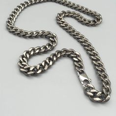 10.5 mm Solid Titanium Chain: Curb link chain made of pure titanium.  100% hypoallergenic, very light weight, durable, comfortable for everyday wear. Size:10.5 mm x 650 mm Two different clasps is Panlong clasp and 8 clasp. Clasp 1: Steel panlong Clasp Clasp 2:Titanium 8 Clasp (inside spring is steel) Gunmetal Cable Chain Link Necklace, Gunmetal Link Chain Necklace In Stainless Steel, Style Necklace, Curb Chain, Chain Styles, Chains Necklace, Large Size, Chain Necklace, Everyday Wear