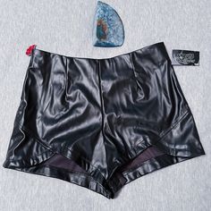 Spencer’s Naruto Shippuden Leather Shorts, Cute Cut Outs In Front, With A Akatsuki Cloud Charm On The Zipper :) Size Large, Fit Like A Medium New With Tags! Black Polyurethane Bottoms For Club, Black Faux Leather Shorts For Club, Casual Black Polyurethane Bottoms, Edgy High-waisted Faux Leather Shorts, Black Leather Edgy Shorts, Edgy Black Leather Shorts, Black Polyurethane Bottoms For Night Out, Edgy Black Faux Leather Shorts, Edgy Leather Bottoms For Summer