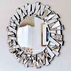 a mirror that has some pictures on it