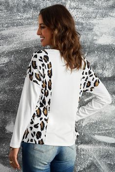 Leopard Splicing Criss Cross V Neck Blouse Chic Fall Tops With Splicing, Fall V-neck Top With Splicing Details, V-neck Splicing Top For Fall, V-neck Spliced Top For Fall, Fall V-neck Spliced Tops, Chic Spliced Blouse For Fall, White V-neck Top With Patchwork, Chic Fall Blouse With Splicing Details, White Spliced V-neck Tops