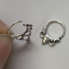 "These are so pretty and light. Made is 925 sterling silver with tribal details. The rings are all 10mm (1cm or .40\") in diameter. The wire is 18 gauge. They are only finished on one side since each one is made BY HAND so there may be very slight differences. One of the images contains numbers to specify which you would like from the drop down menu." Adjustable Round Bohemian Nose Rings, Internally Threaded Silver Septum Ring, Silver Internally Threaded Hoop Body Jewelry, Nickel-free Sterling Silver Septum Ring, Sterling Silver Septum Ring, Nickel Free Silver Rings For Festival, Nickel-free Silver Rings For Festival, Adjustable Nickel Free Silver Body Jewelry, Adjustable Nickel-free Silver Body Jewelry