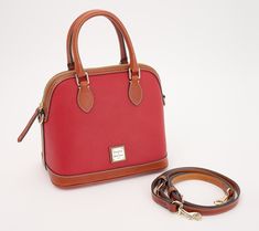 A classic carry that holds its shape and works as a shoulder bag or crossbody, this pebble leather satchel is coming with to every sophisticated destination. From Dooney & Bourke. Fall Satchel With Detachable Strap And Pebbled Leather, Fall Pebbled Leather Satchel With Detachable Strap, Pebbled Leather Satchel For Travel In Fall, Fall Travel Satchel In Pebbled Leather, Dooney And Bourke, Dooney & Bourke, Leather Satchel, Dooney Bourke, Fashion Handbags