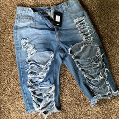 Distressed Fashion Nova Denim Shorts. Come To Probably Knee Length. Never Worn. Too Big. Ripped Denim Short Jeans, Trendy Distressed Knee-length Jean Shorts, Casual Ripped Knee-length Jeans, Ripped Denim Shorts In Blue, Trendy Ripped Knee-length Shorts, Distressed Denim Knee-length Shorts, Distressed Knee-length Shorts For Spring, Blue Distressed High-waisted Shorts Jeans, Trendy Ripped Denim Blue Shorts