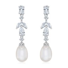 Introducing Downton Abbey by REEDS Jewelers. These earring are inspired by Lady Edith, the second daughter of Lord and Lady Grantham. Fashioned in sterling silver, these drop earrings feature created white sapphires and freshwater cultured pearls in a vintage-inspired design that takes inspiration from Edith's understated flapper flare. These earrings measure 29.8mm in length and 6.4mm in width. (c) Focus Features LLC | Downton and Downton Abbey TM and TV series (c) Carnival Film & Televisio Lady Grantham, Lord And Lady, Wedding Day Jewelry, Sterling Silver Drop Earrings, Freshwater Cultured Pearls, Downton Abbey, Diamond Drop Earrings, Silver Drop Earrings, White Sapphire