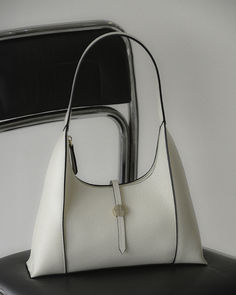 Incoming, your new favourite go to shoulder bag has landed called SHILO. The silhouette features curves and squared edges for unique take on the classic shoulder bag shape. The soft tumbled leather, zip closure and keep strap make SHILO both chic and practical for all day wear and secure essentials. Right To Privacy, White Leather, Off White, Shoulder Bag, Leather, How To Wear