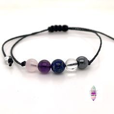 A great rejuvenation tool if you or someone you know needs extra healing energy around them! This 6mm crystal healing bracelet has a lovely combination of pink rose quartz, deep purple amethyst, rich deep blue lapis lazuli, clear quartz, and deep grey genuine non-magnetic hematite.  These 5 gems in this comfy beaded bracelet are perfect crystals for anyone who is recovering or who needs crystal energy. This genuine gemstone bracelet features 5 dainty 6mm beads in the center for a light dainty mi Hematite Bracelet, Crystal Energy, Energy Bracelets, Rose Quartz Bracelet, Healing Crystal Jewelry, Crystal Healing Bracelets, Minimalist Bracelet, Amethyst Bracelet, Blue Lapis