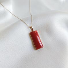 This stunning Pendant is set in 14k Solid Yellow Gold with Natural Coral with utmost precision. It is a unique gemstone Pendant for nearly every occasion and is completely hassle-free jewelry. ITEM DETAILS: * Gem: Coral * Gem Size: 10X24mm * Gem Shape: Rectangle * Gem Weight: 15.49 carats * Gold Purity: 14KT  * Gold Weight: 0.71 gram * Total Weight of the Pendant: 3.81 gram The Gold purity is guaranteed and it comes with authentic 14KT gold hallmark. Since my items are handmade, they are absolut Elegant Hallmarked Rectangular Pendant Jewelry, Gold Jewelry With Rectangular Polished Stone, Gold Jewelry With Polished Finish And Rectangular Stone, Fine Jewelry Rectangular Pendant As Gift, Red Rectangular Jewelry With Polished Finish, Anniversary Jewelry With Rectangular Polished Pendant, 14k Gold Gemstone Rectangular Pendant Necklace, 14k Gold Necklace With Gemstone In Rectangular Pendant, Fine Jewelry With Polished Rectangular Stone