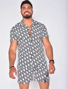 This summer beachwear is your go-to during those hot days. Look stylish no matter the season. Set come together, top and shorts. Size: True To SizeCollar: NotchedPant Closure Type: Elastic WaistMaterial Composition: Polyester Summer Printed Collared Tops, Summer Collared Printed Tops, Black Collared Shirt For Beach Season, Black Short Sleeve Summer Shirt, Short Cotton Tops For Summer, Black Short Tops For Vacation, Summer Cotton Tops With Short Shape, Fitted Summer Beach Shirt, Black Hawaiian Shirt For Summer