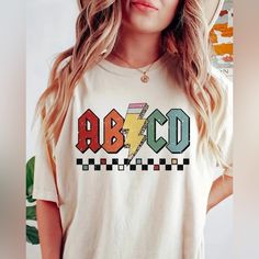 Abcd Ac/Dc Shirt. Brand New! Perfect For All Teachers And Instructors And Professors For The School Year! Simple Teacher Shirts, Teacher Design Shirts, Teacher Shirt Cricut, Sporty Teacher Outfits, Teacher T-shirts, Teacher Graphic Tees, Daycare Worker Outfits, Class Shirt Ideas, Casual Teacher Outfits Summer